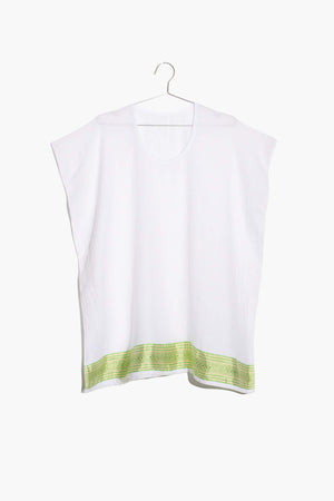 The Mimi Top is like your oversized tee but better. This semi-sheer cotton top is comfy without sacrificing style. It features a rich pattern along the bottom hem, inspired by Ethiopian textile design.