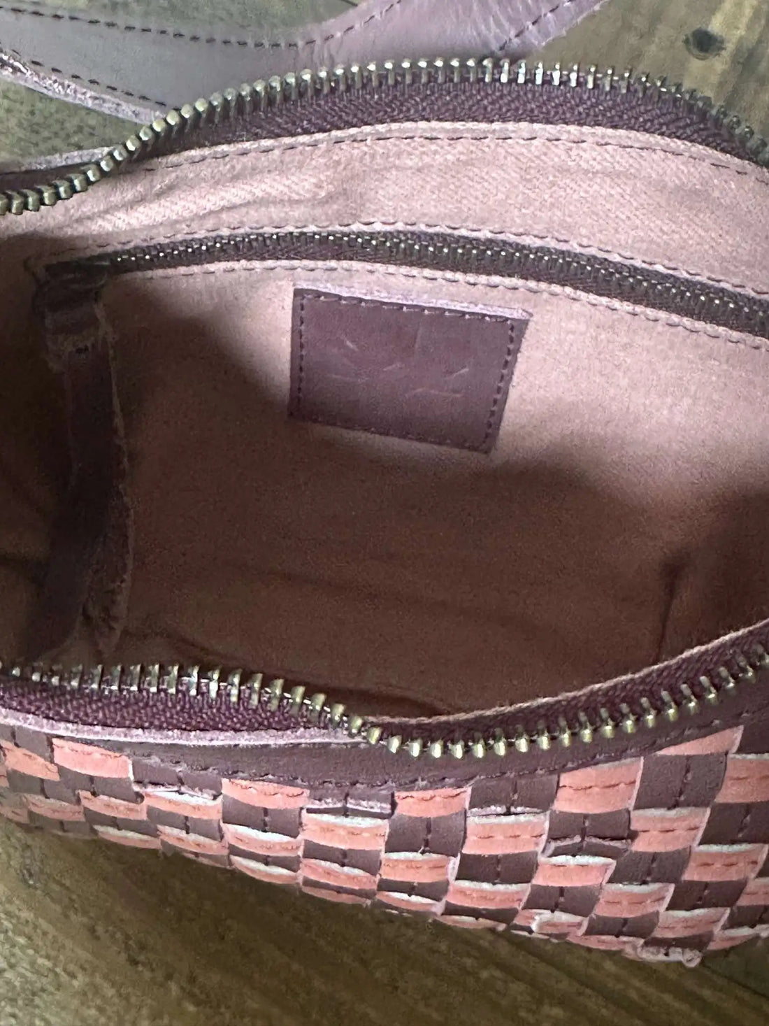 Bella Crescent Shoulder Bag in Garnet Desert Rose — handcrafted in Ethiopia with a handwoven checkered weave in plum purple, dusty rose pink, and deep burgundy upcycled leather- Inside View 