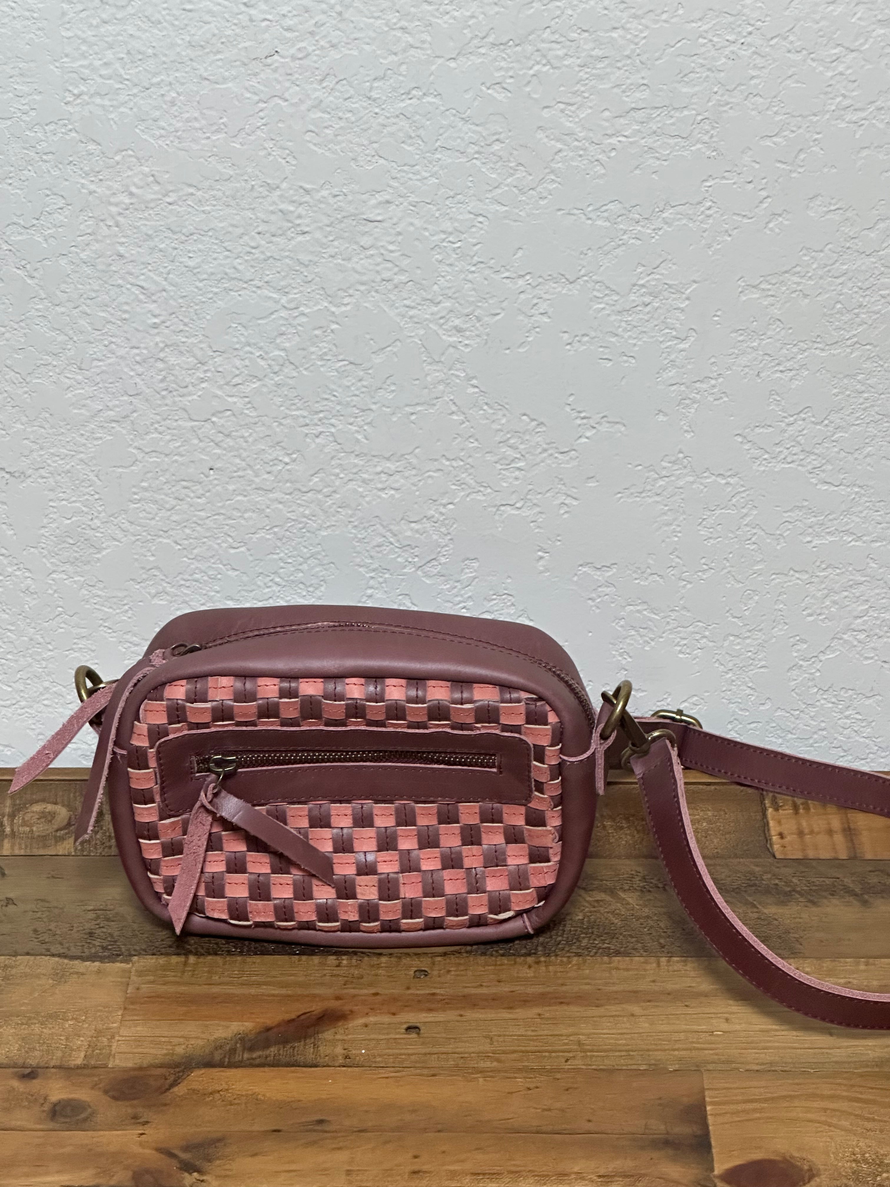 Gode Bag in Garnet Desert Rose — artisan-made upcycled leather bag with handwoven checkered pattern in plum purple, dusty rose pink, and deep burgundy tones.
