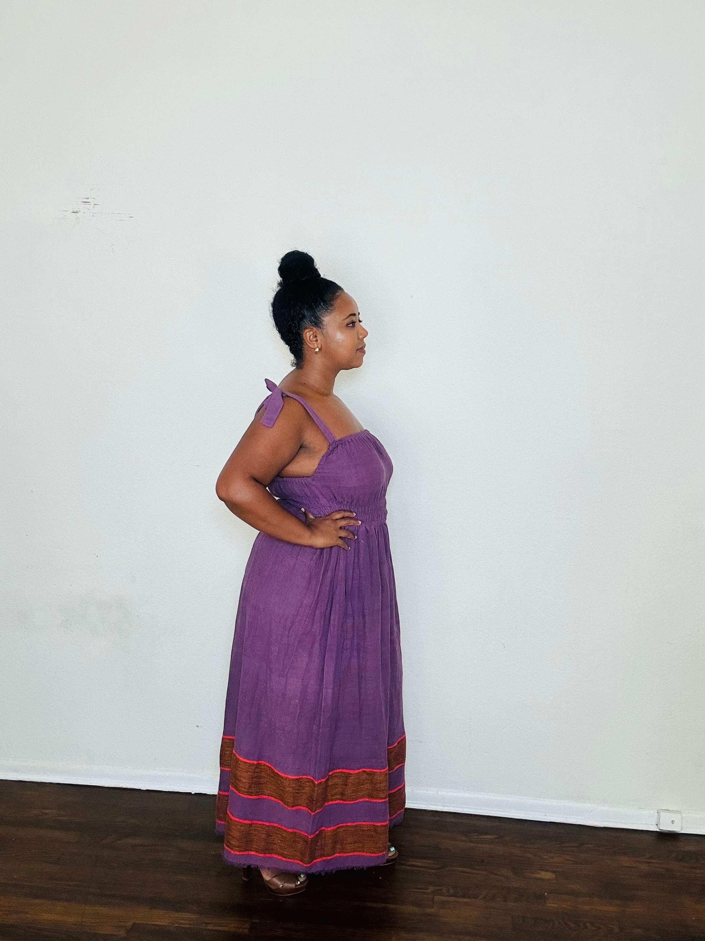 Rawhi Dress Purple Royal Fig — handmade 100% cotton maxi dress with straight neckline, adjustable straps, cinched waist, and flowing A-line silhouette in a rich fig-purple tone, complete with pockets.
