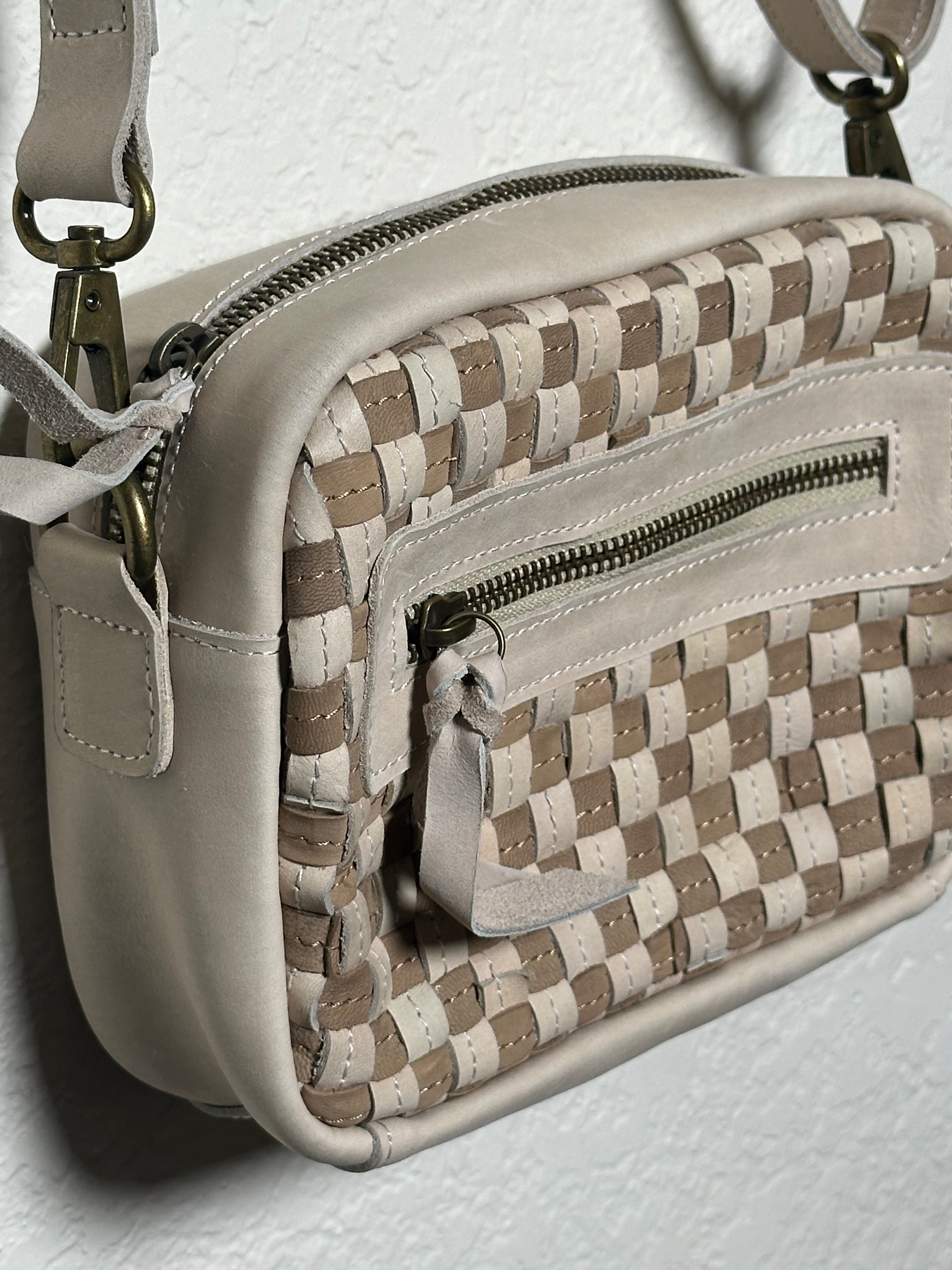 ShopYego Gode Mini Camera Bag Sahara Dune – artisan leather crossbody with off-white and sand checkered weave, versatile shoulder or crossbody wear, handmade in Ethiopia