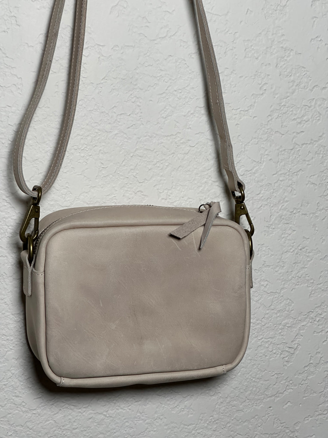 ShopYego Gode Mini Camera Bag Sahara Dune – artisan leather crossbody with off-white and sand checkered weave, versatile shoulder or crossbody wear, handmade in Ethiopia