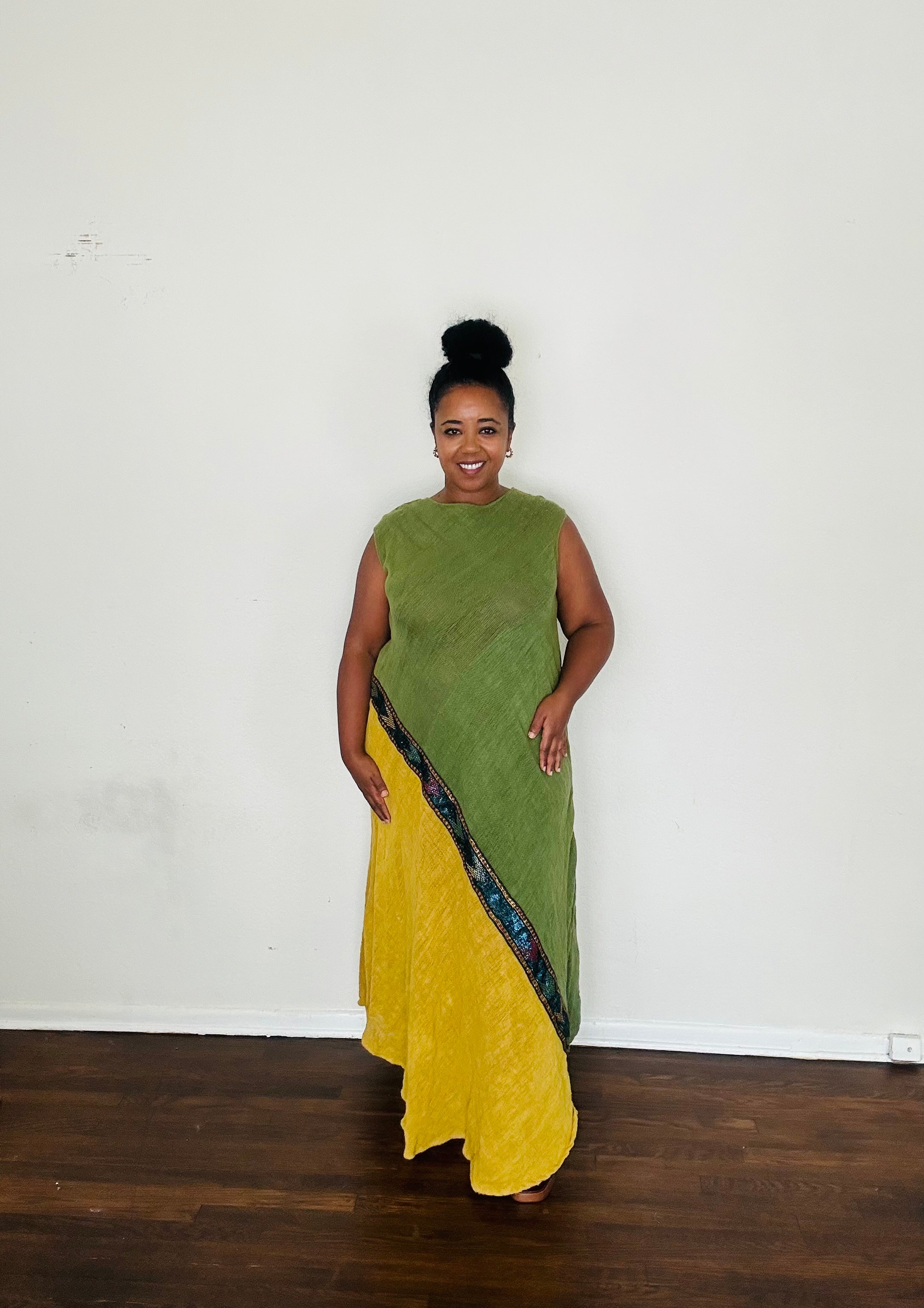 Naomi Dress in Sage Earth — handmade 100% cotton maxi dress with asymmetrical tilet-inspired design in warm yellow-khaki tones, designed to elongate and flatter.