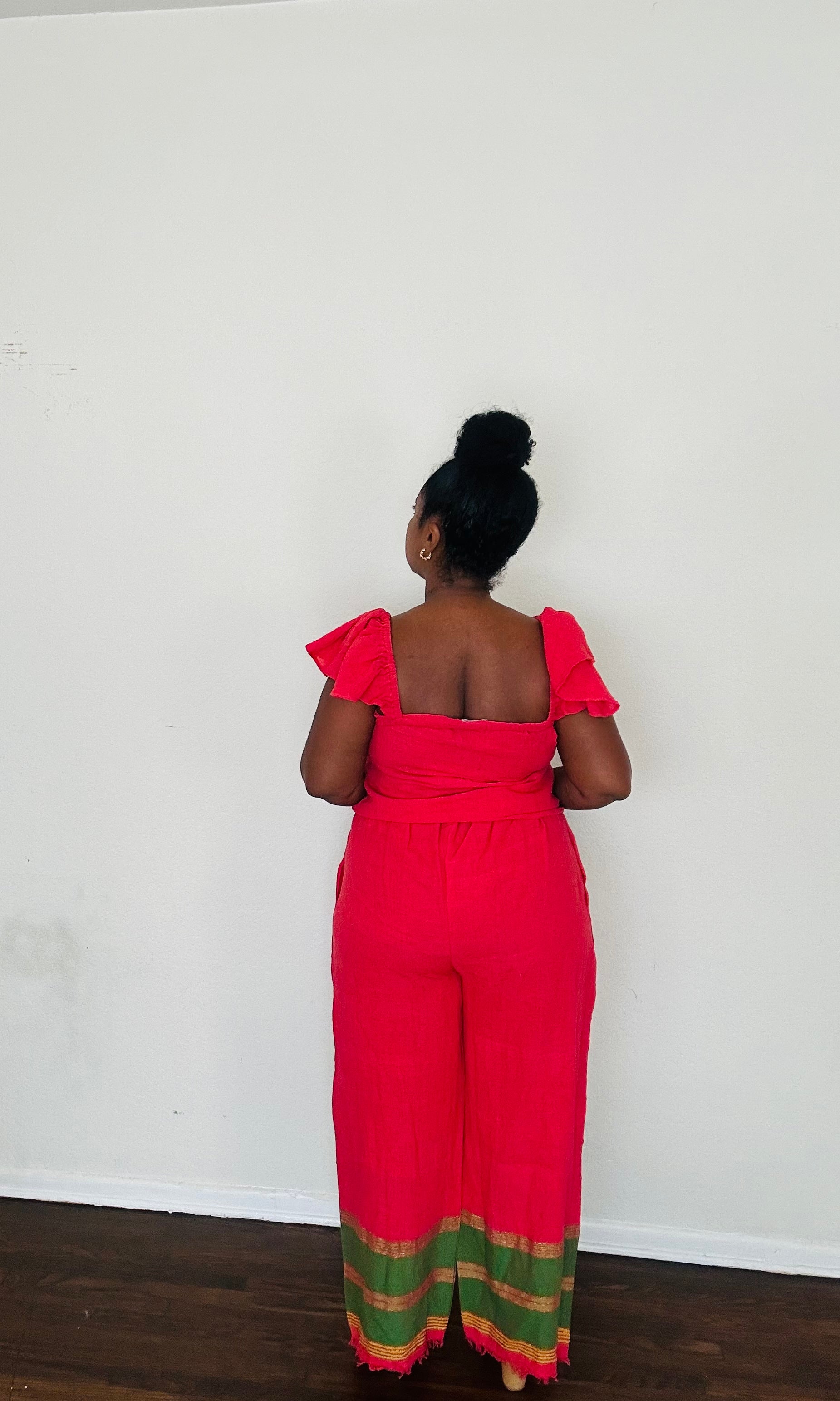 Rahel Pants Lush Fuschia — handmade 100% cotton pants with relaxed silhouette, elastic waist, side pockets, and bold fuchsia body accented by a contrasting green striped hem.