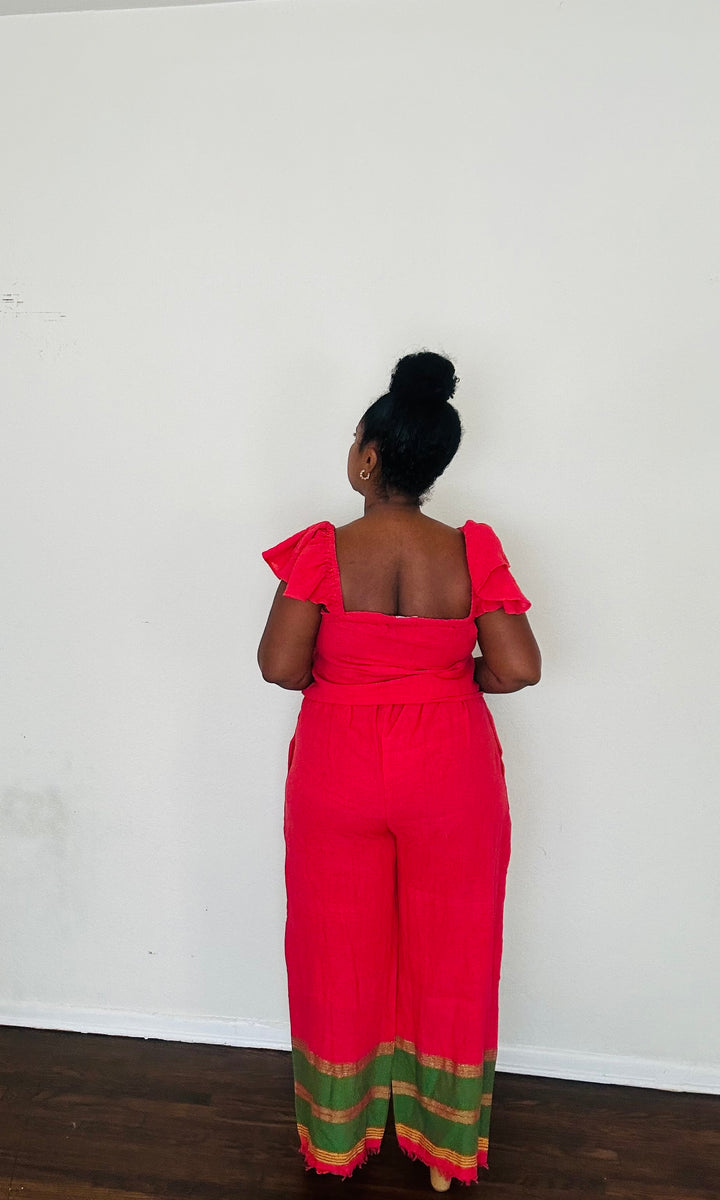 Rahel Pants Lush Fuschia — handmade 100% cotton pants with relaxed silhouette, elastic waist, side pockets, and bold fuchsia body accented by a contrasting green striped hem.