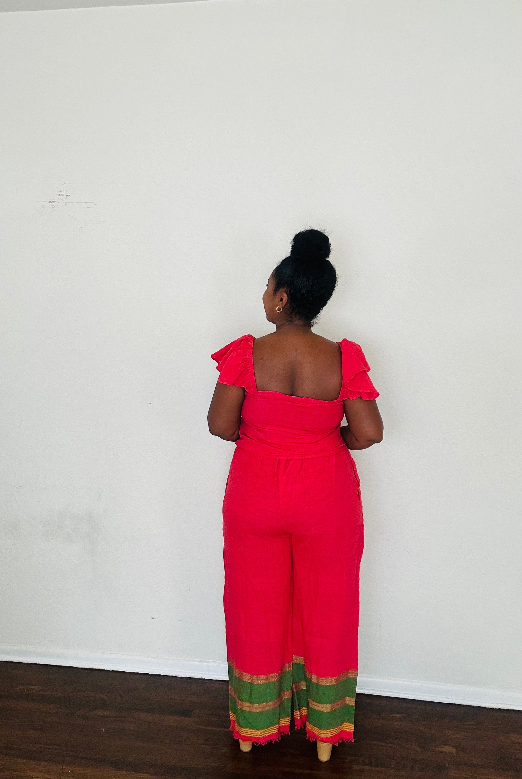 Rahel Pants Lush Fuschia — handmade 100% cotton pants with relaxed silhouette, elastic waist, side pockets, and bold fuchsia body accented by a contrasting green striped hem.