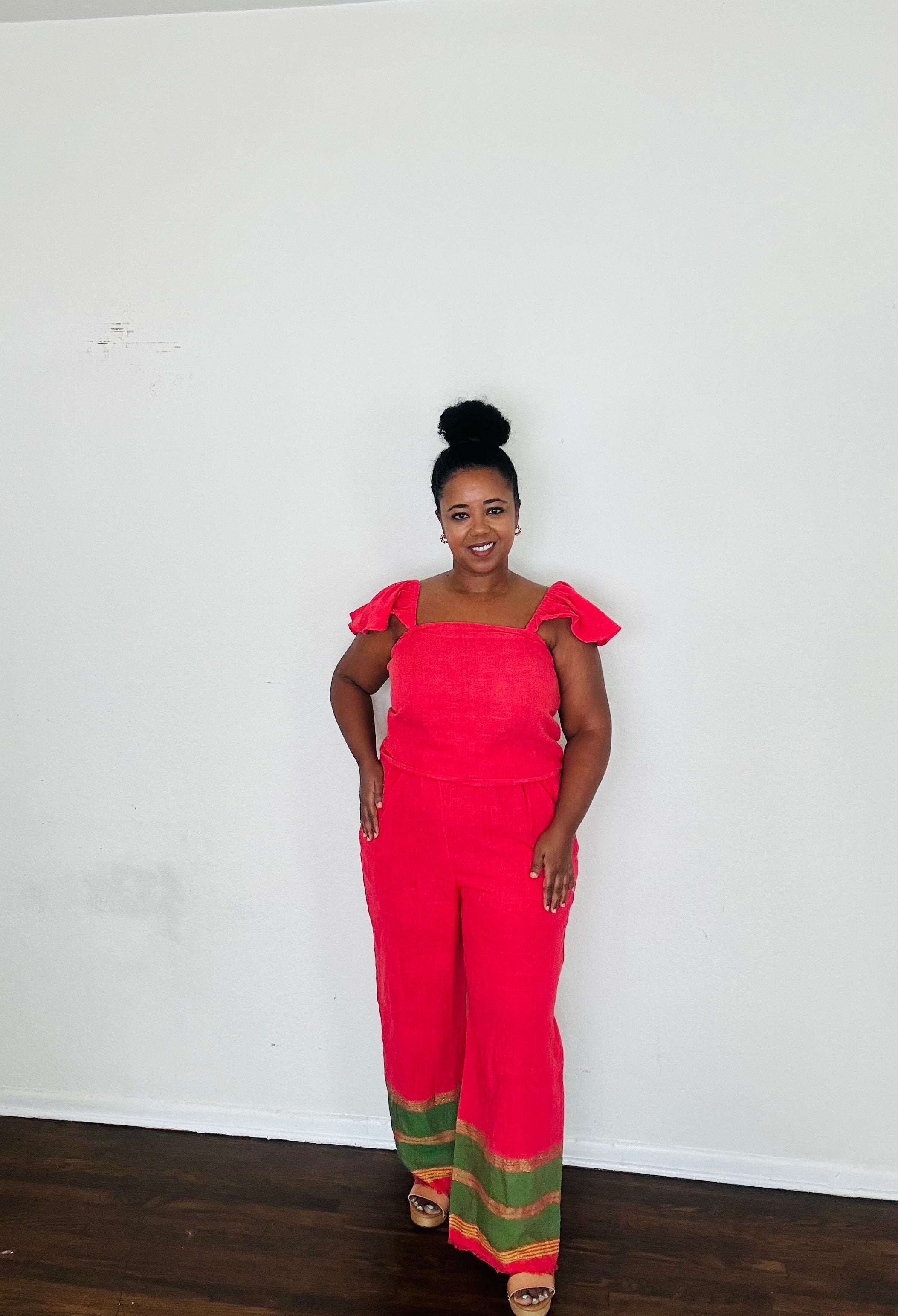 Rahel Pants Lush Fuschia — handmade 100% cotton pants with relaxed silhouette, elastic waist, side pockets, and bold fuchsia body accented by a contrasting green striped hem.