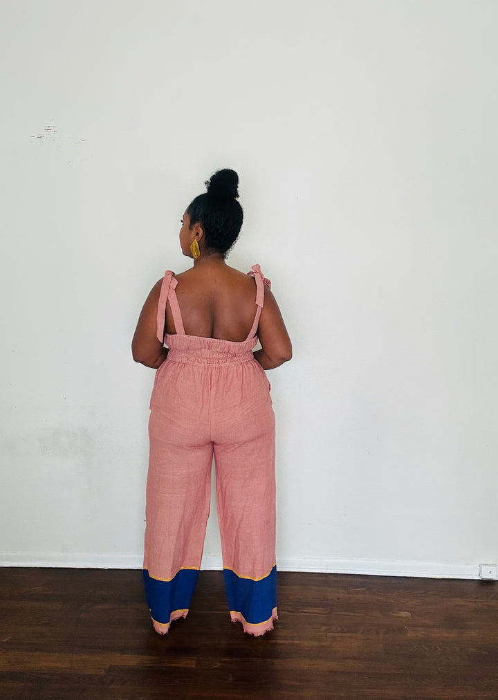 Handmade in Ethiopia from 100% cotton, the Sebie Jumpsuit in Desert Rose brings in this season’s romantic dusty pink trend with effortless LA versatility.