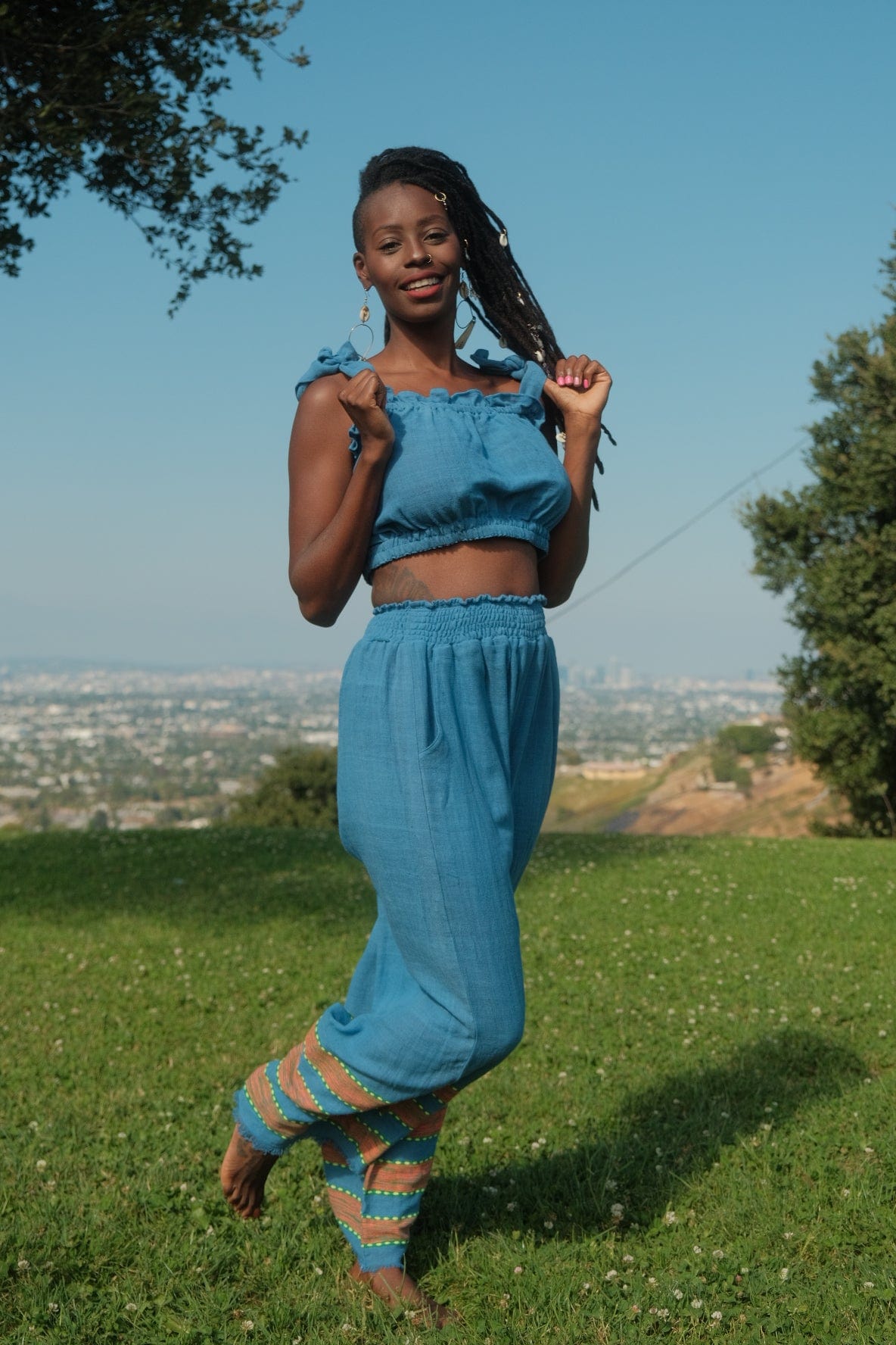 Kidist Pants Azure Blue — handmade 100% cotton wide-leg trousers with elastic waistband, side pockets, and flowing fit